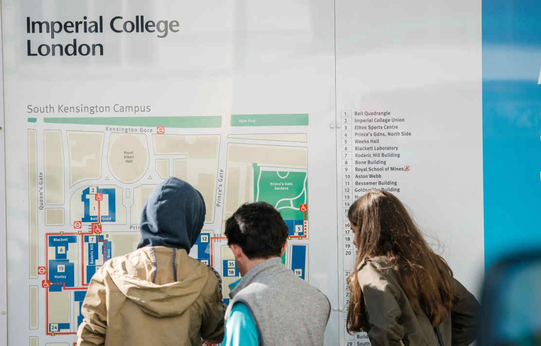 People looking at a campus map