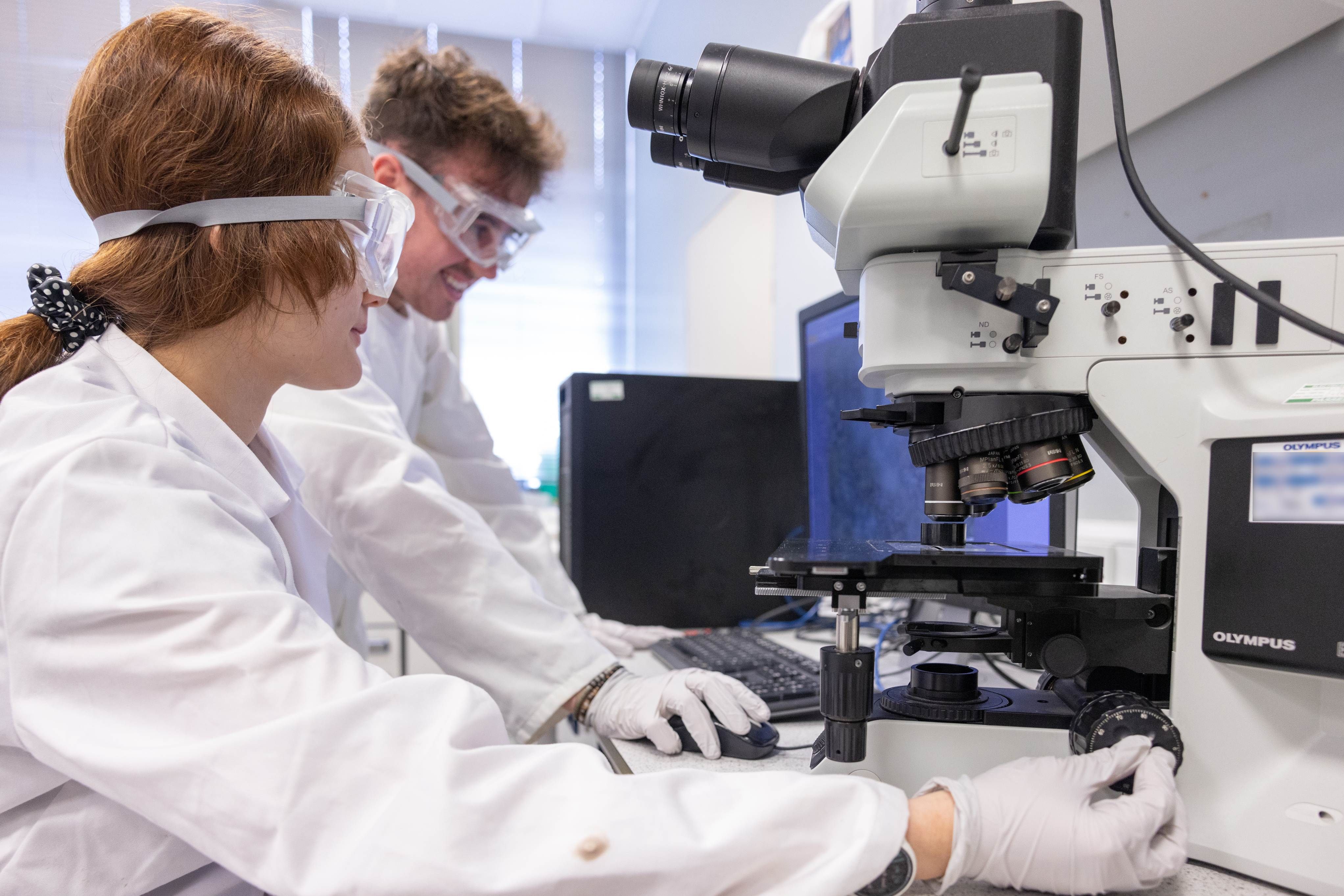 Students in PPE in lab