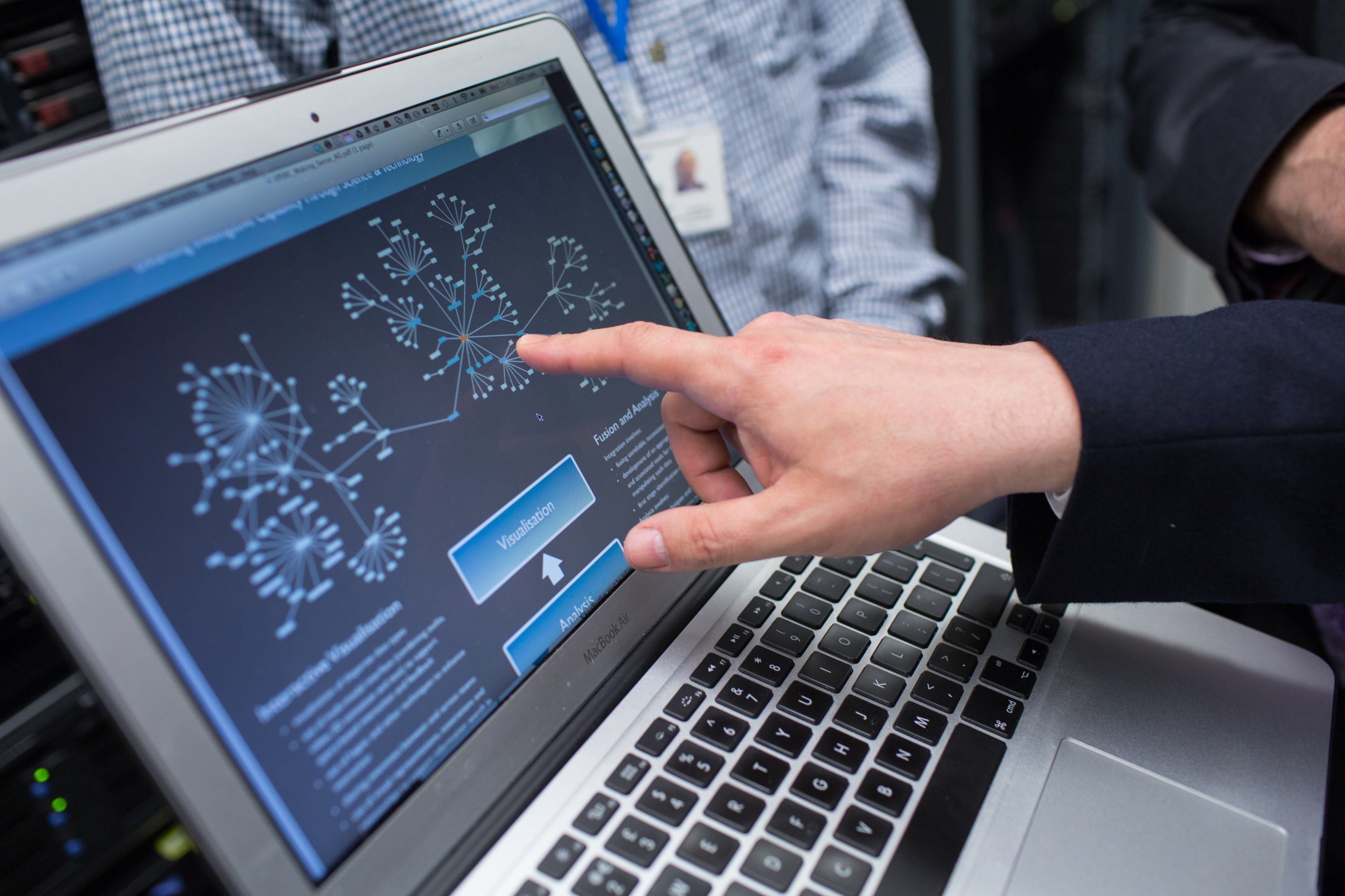 A person looking at a security system on a computer