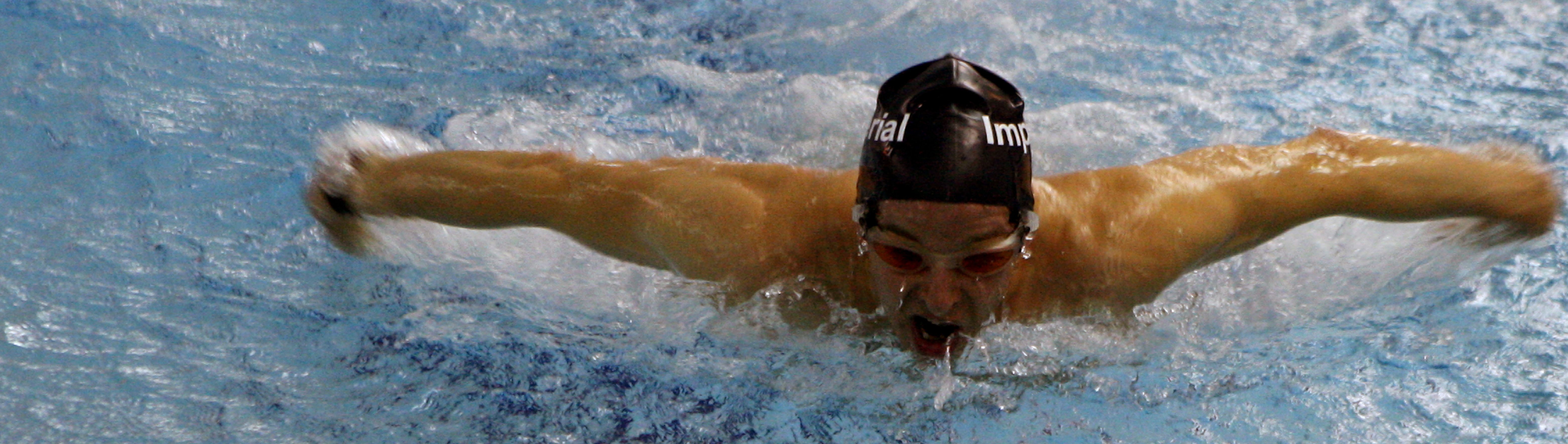 A man swimming in Ethos pool