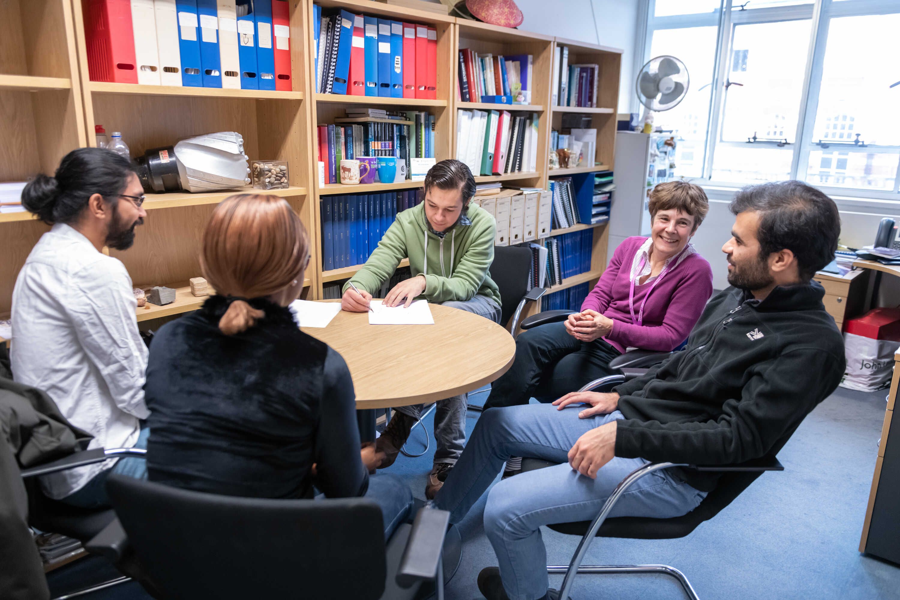 Professor Ann Muggeridge and her PhD student group