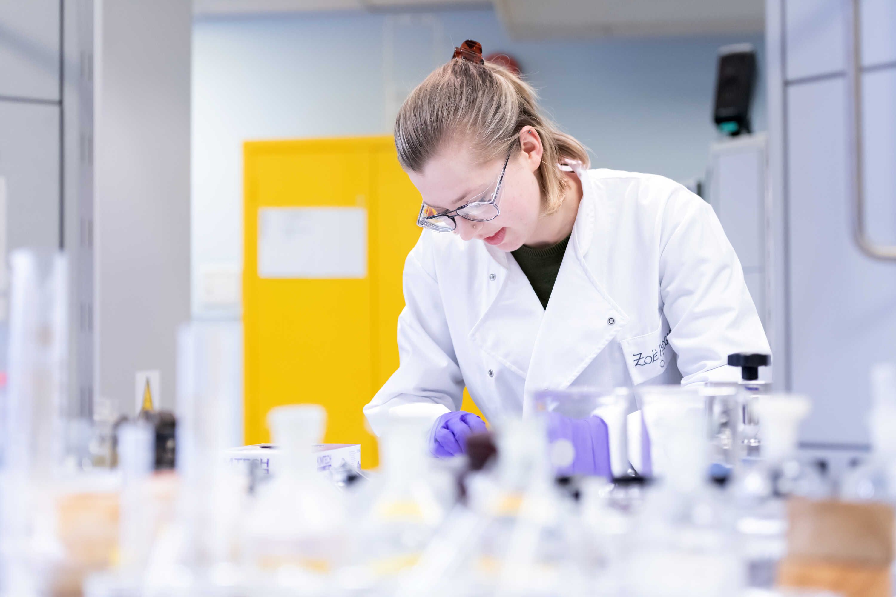 A student works in the Organic Geochemistry Laboratory