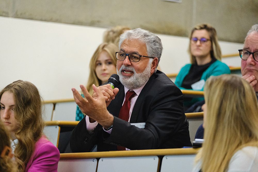 Man in audience with microphone