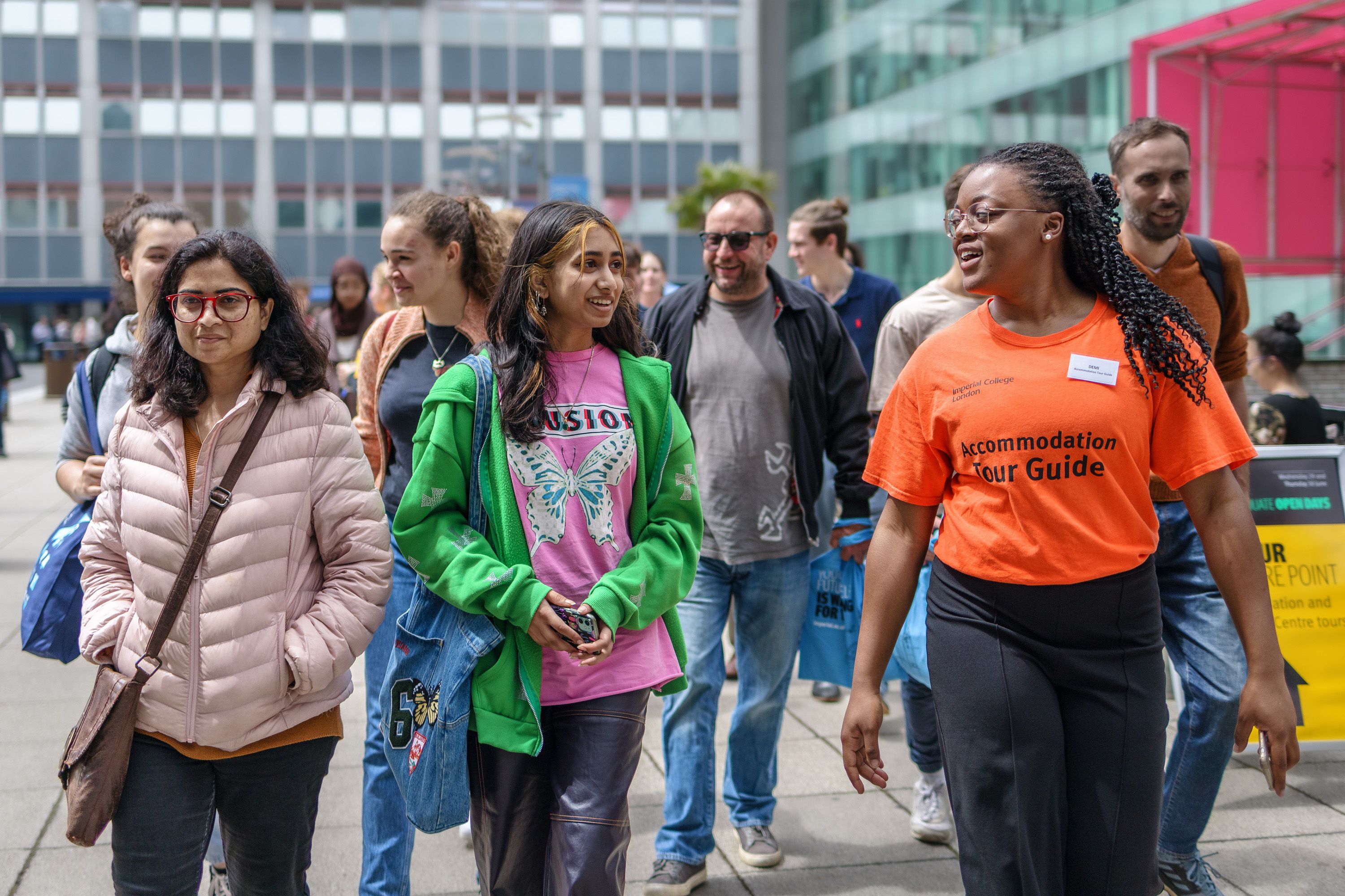 A tour guide leads students across Dalby Court