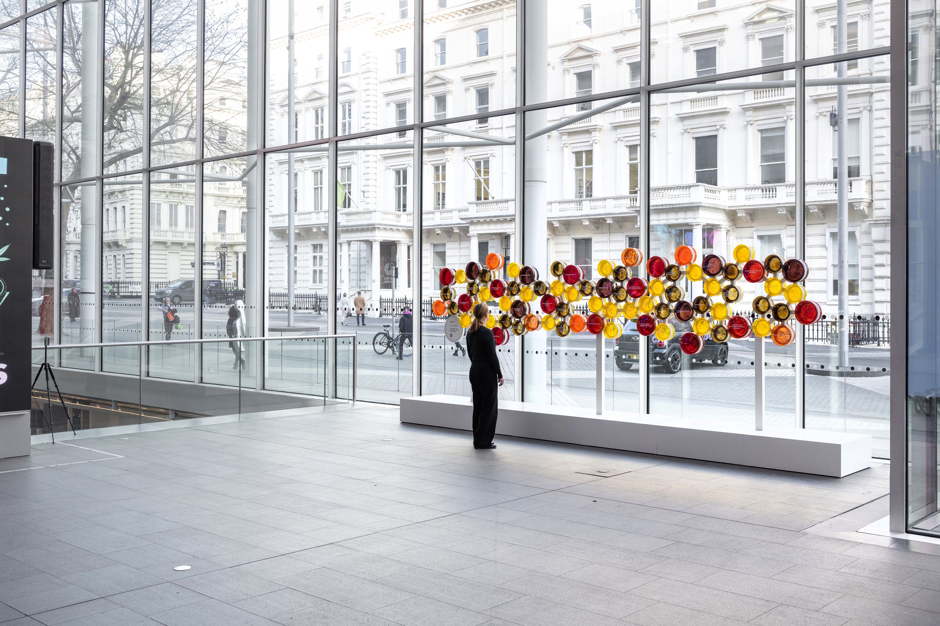 The Circle of Benefactors exhibition in the College's Main Entrance, which consists of circles of coloured glass with the names of donors printed on