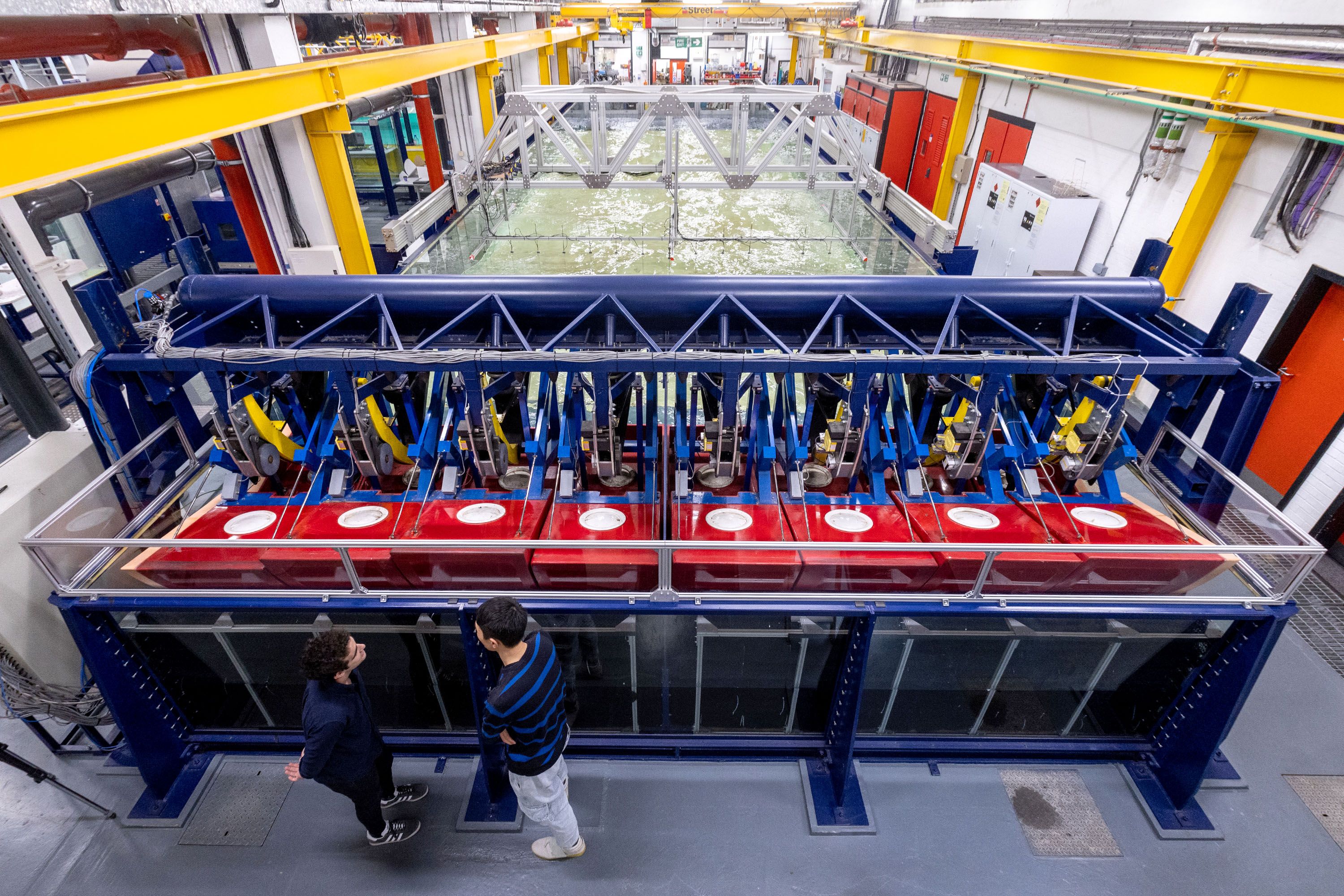 A view from above of a huge wave tank full of water, in a science lab