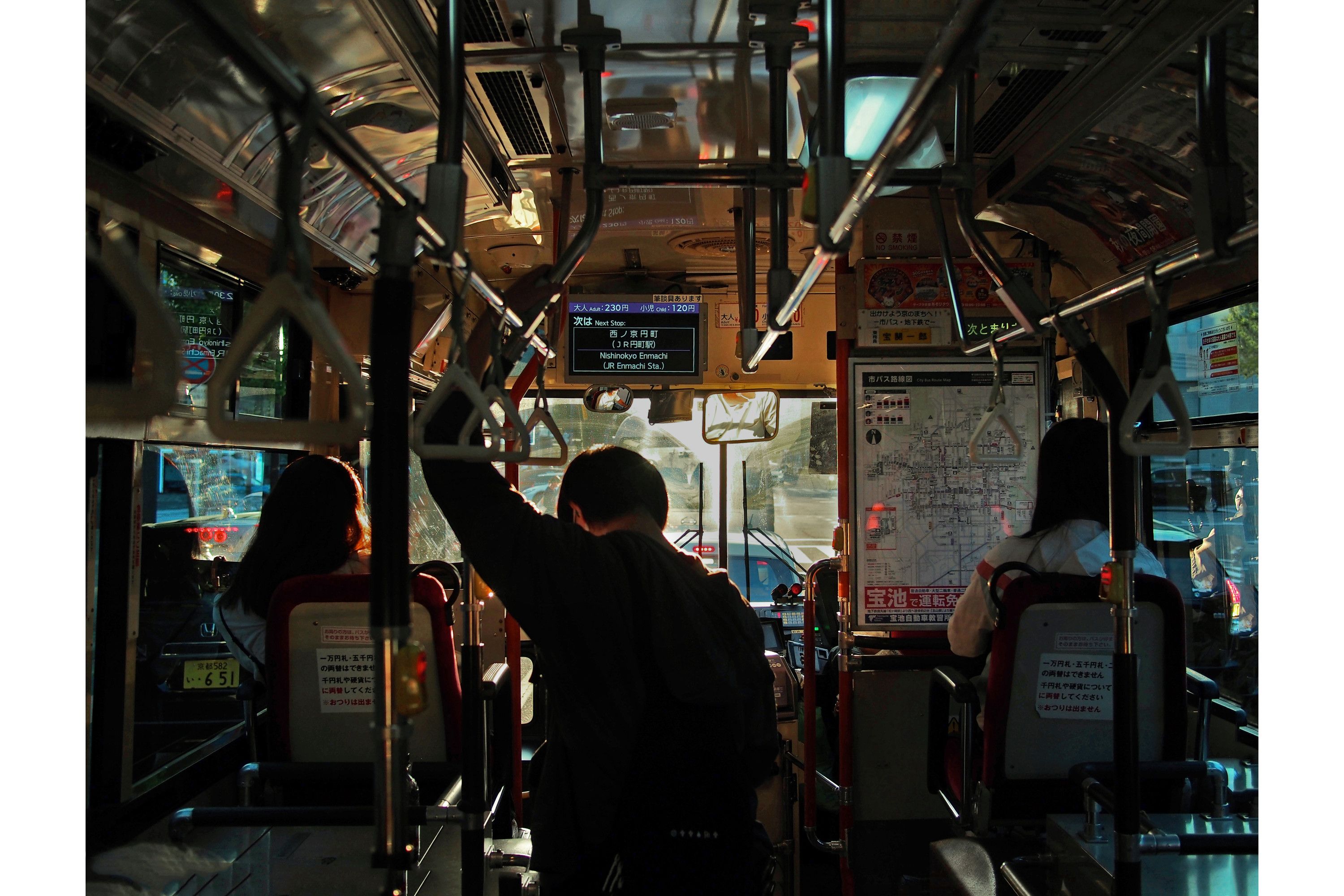 people riding on a bus