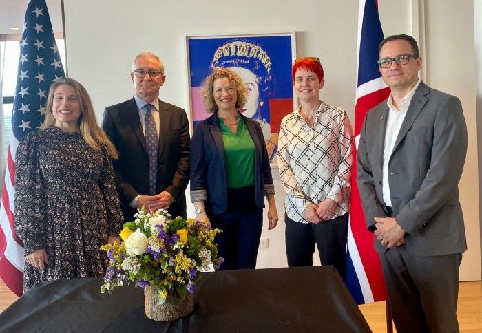 Professor Ryan with President Brady, Cornell officials and the New York British Consul General signing a partnership on AI collaboration