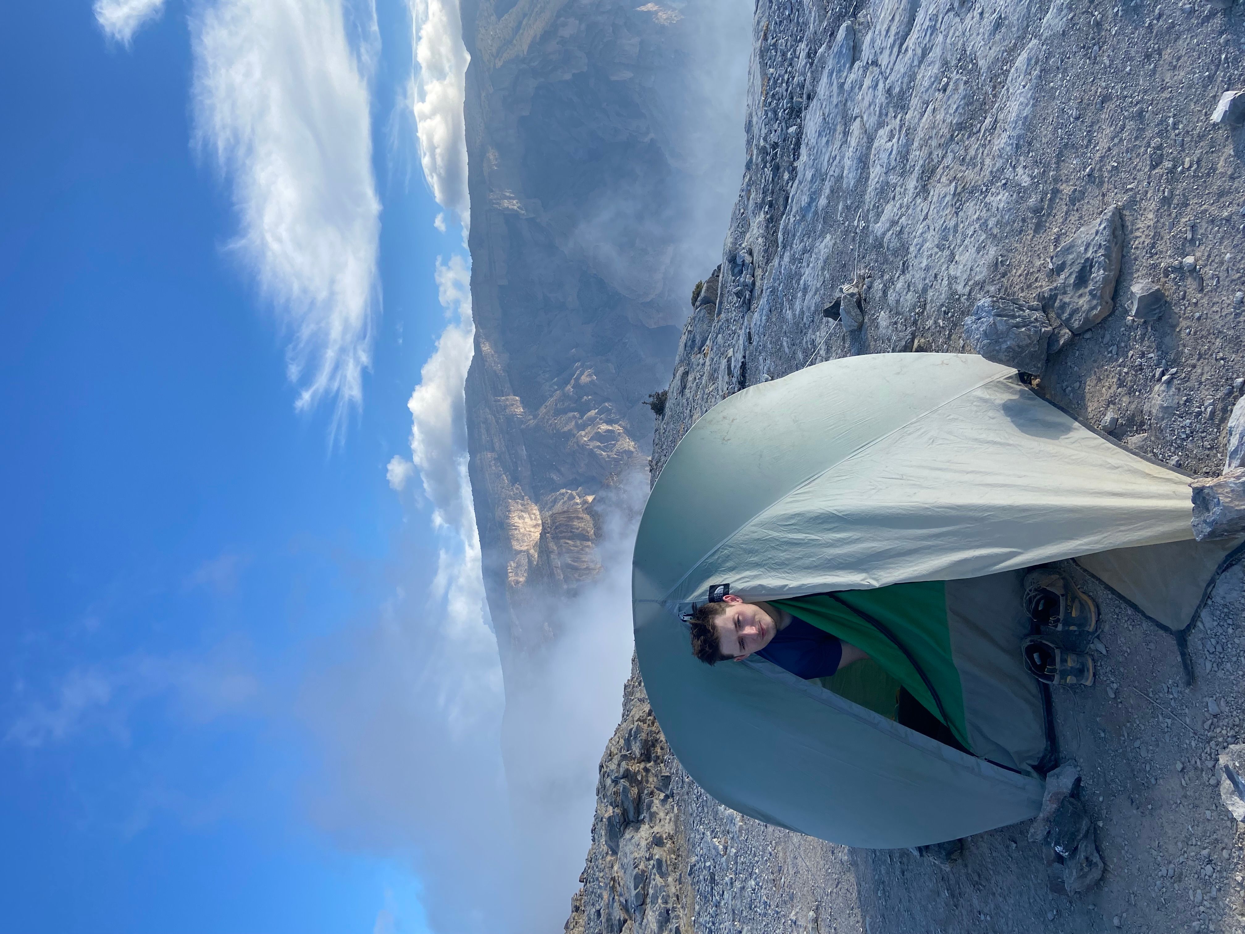 Student in a tent in Oman in 2022