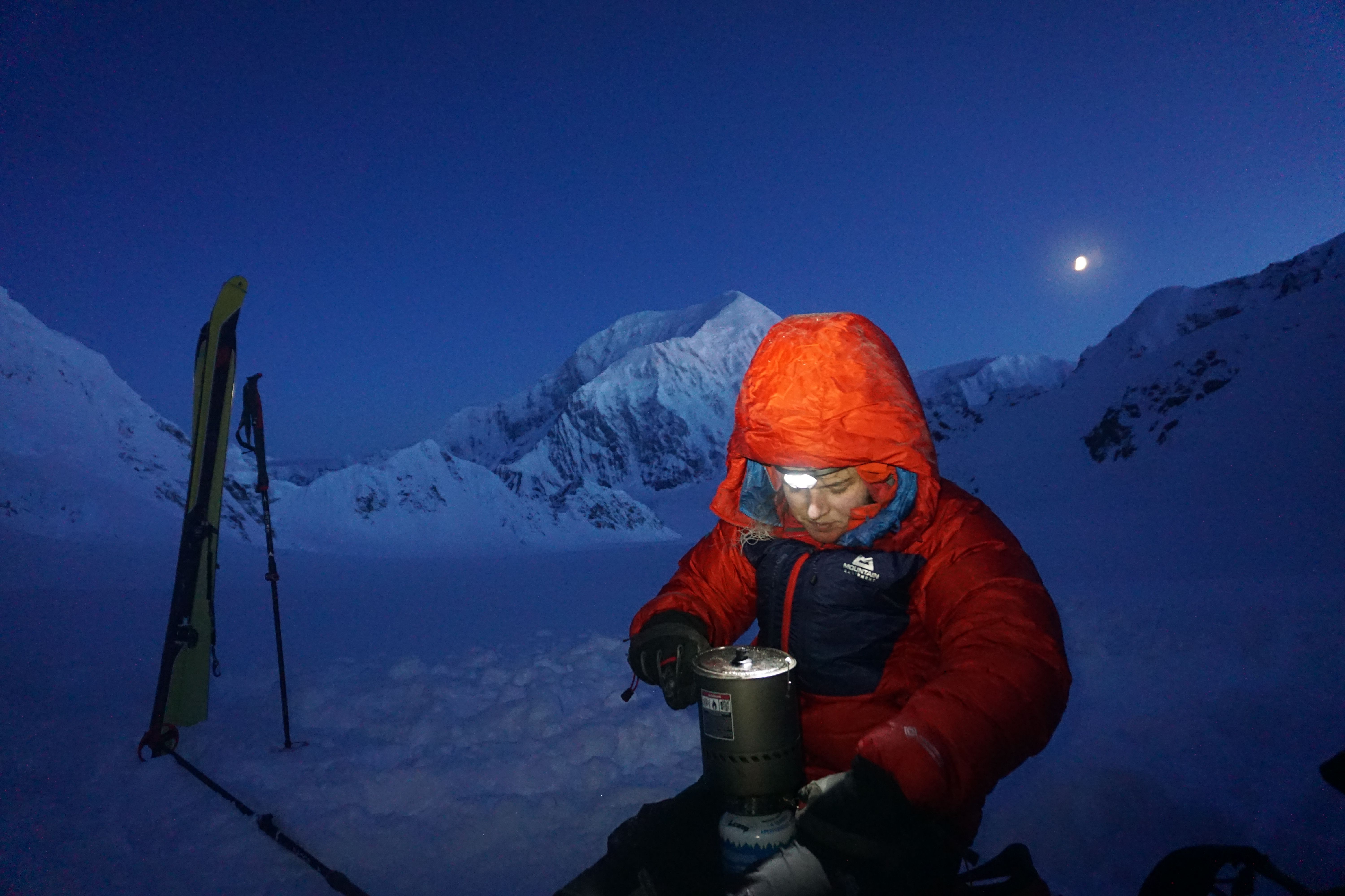 Student cooking on a glacier in Alaska