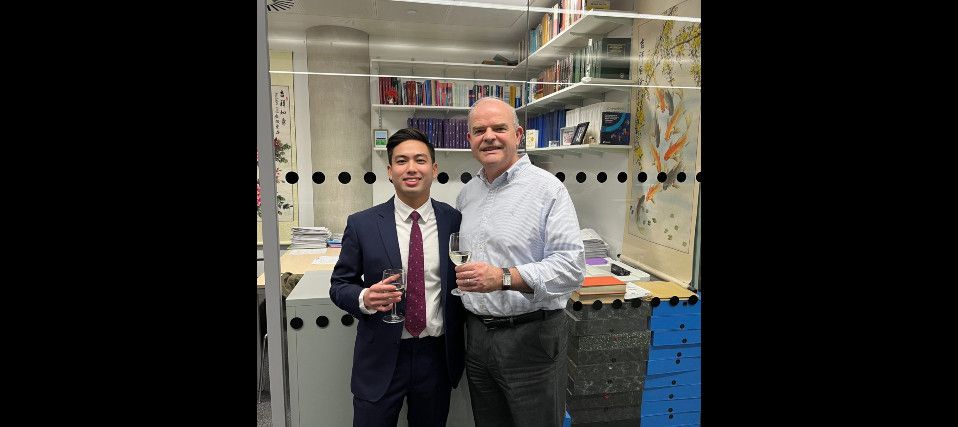 Tom and Nick toasting to a successful viva!