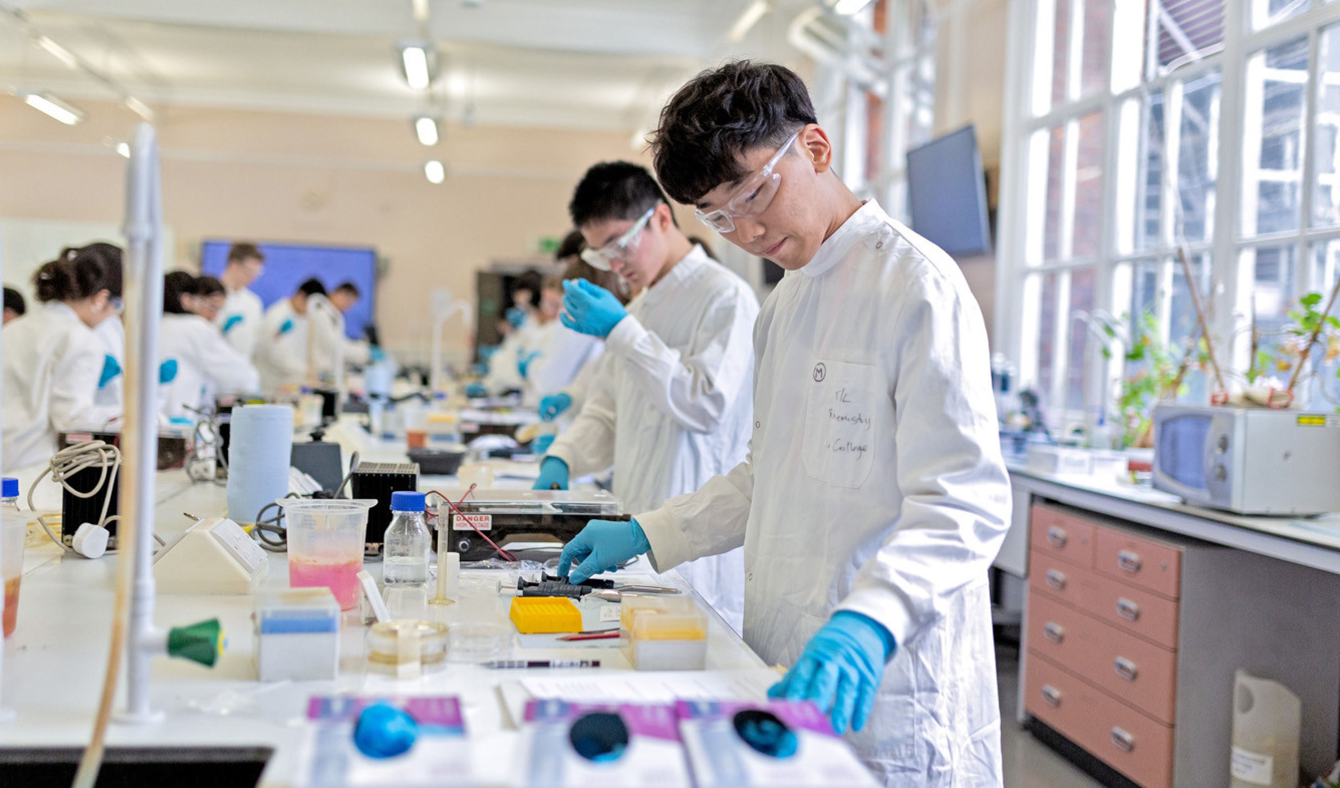 Students conducting hands on experiments