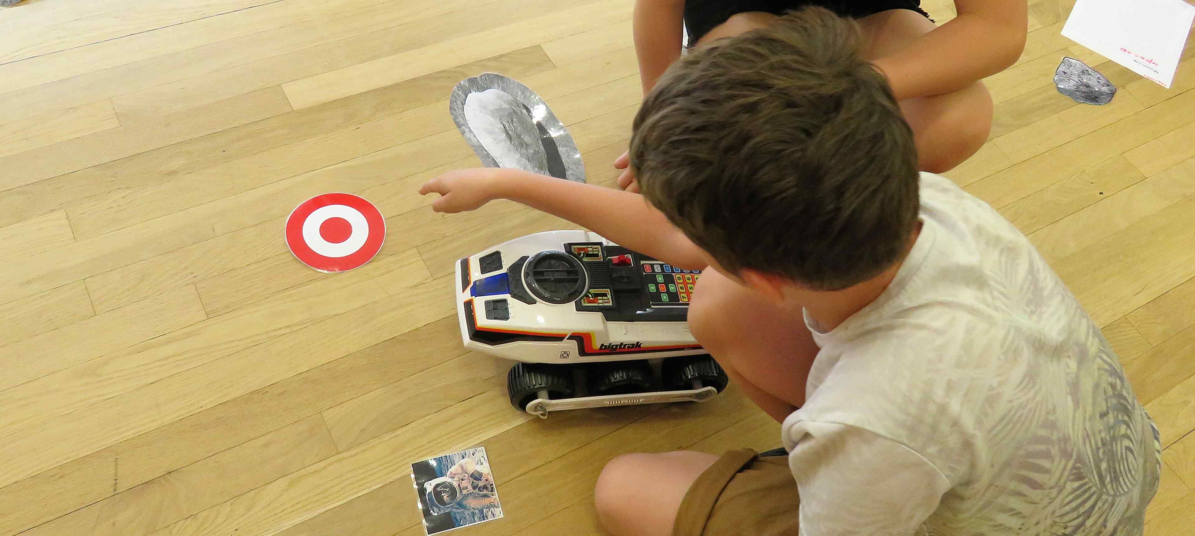 Children racing their robot