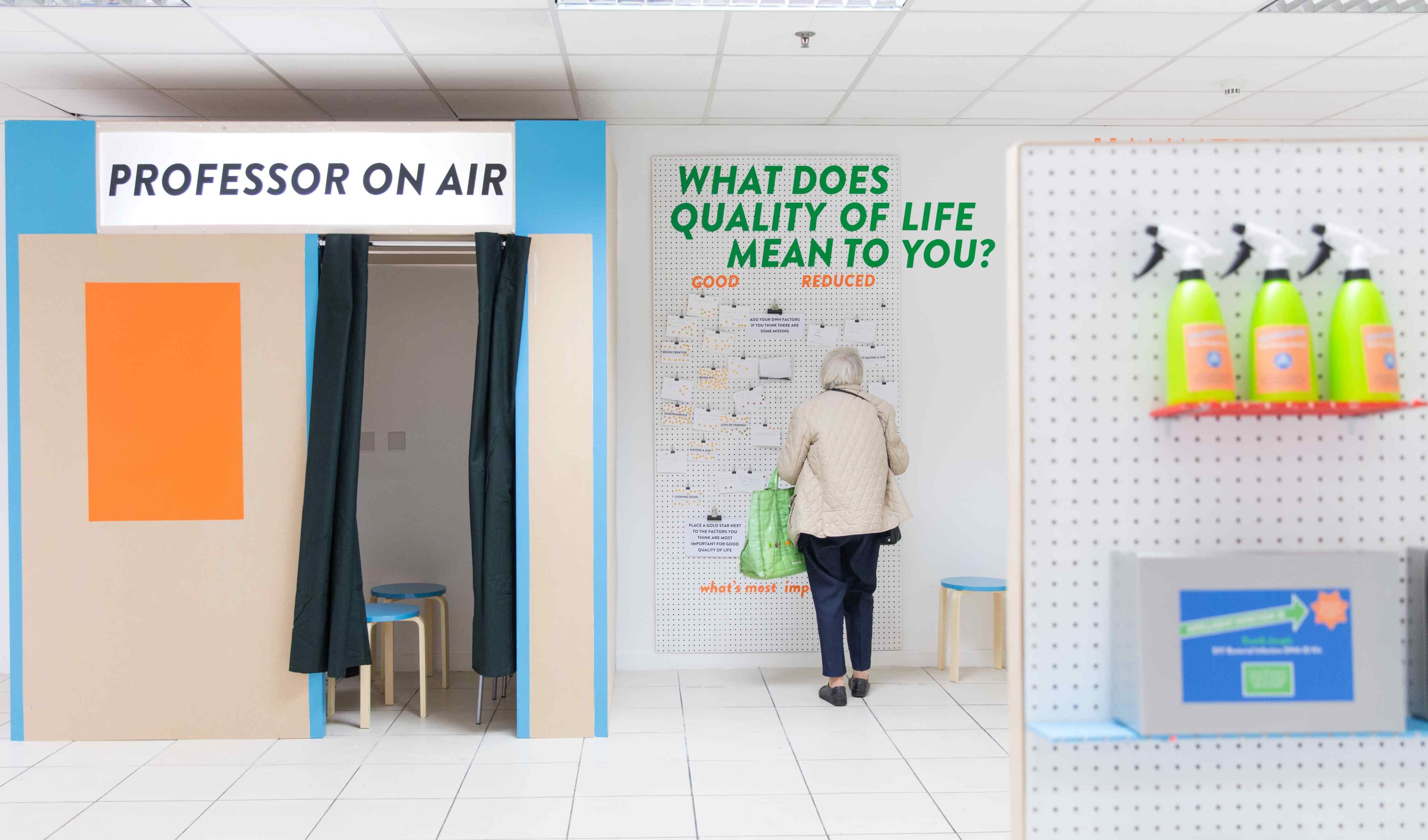 Lady looks at wall display