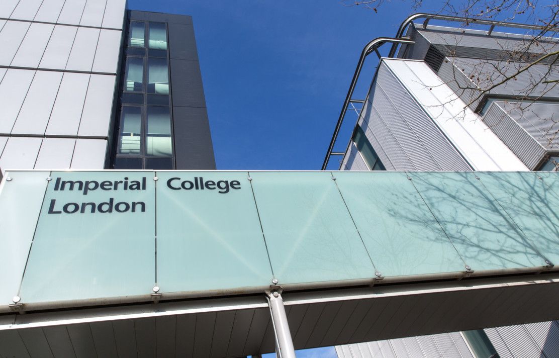 A bridge at Imperial's Hammersmith Campus against a blue sky