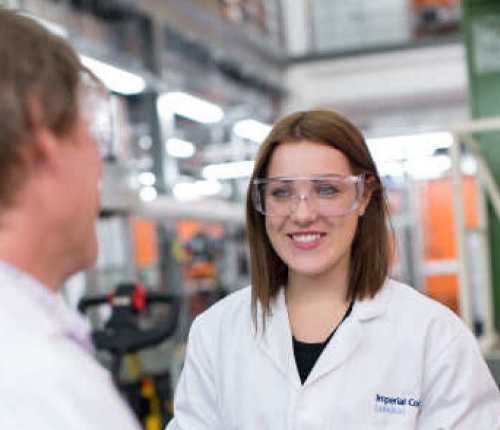 A student and supervisor in the lab.