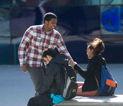 Three people sitting