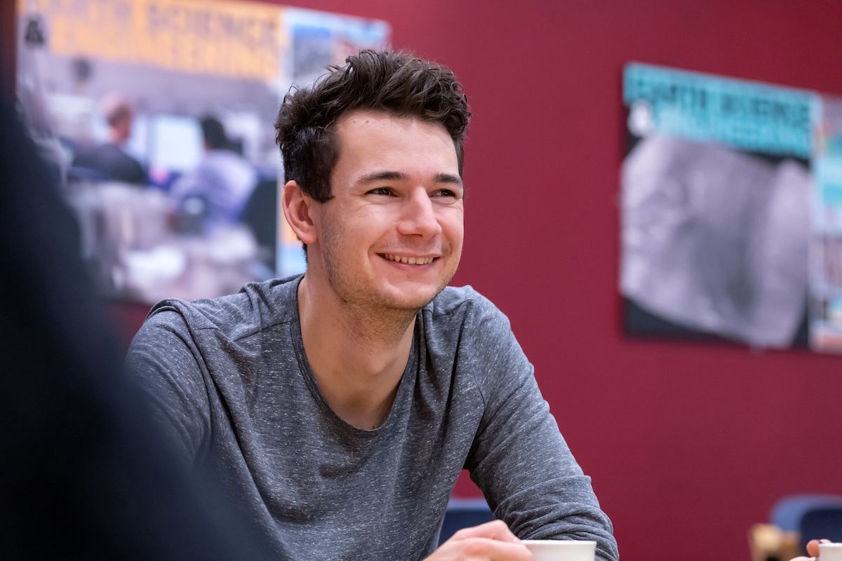 Student smiling on campus