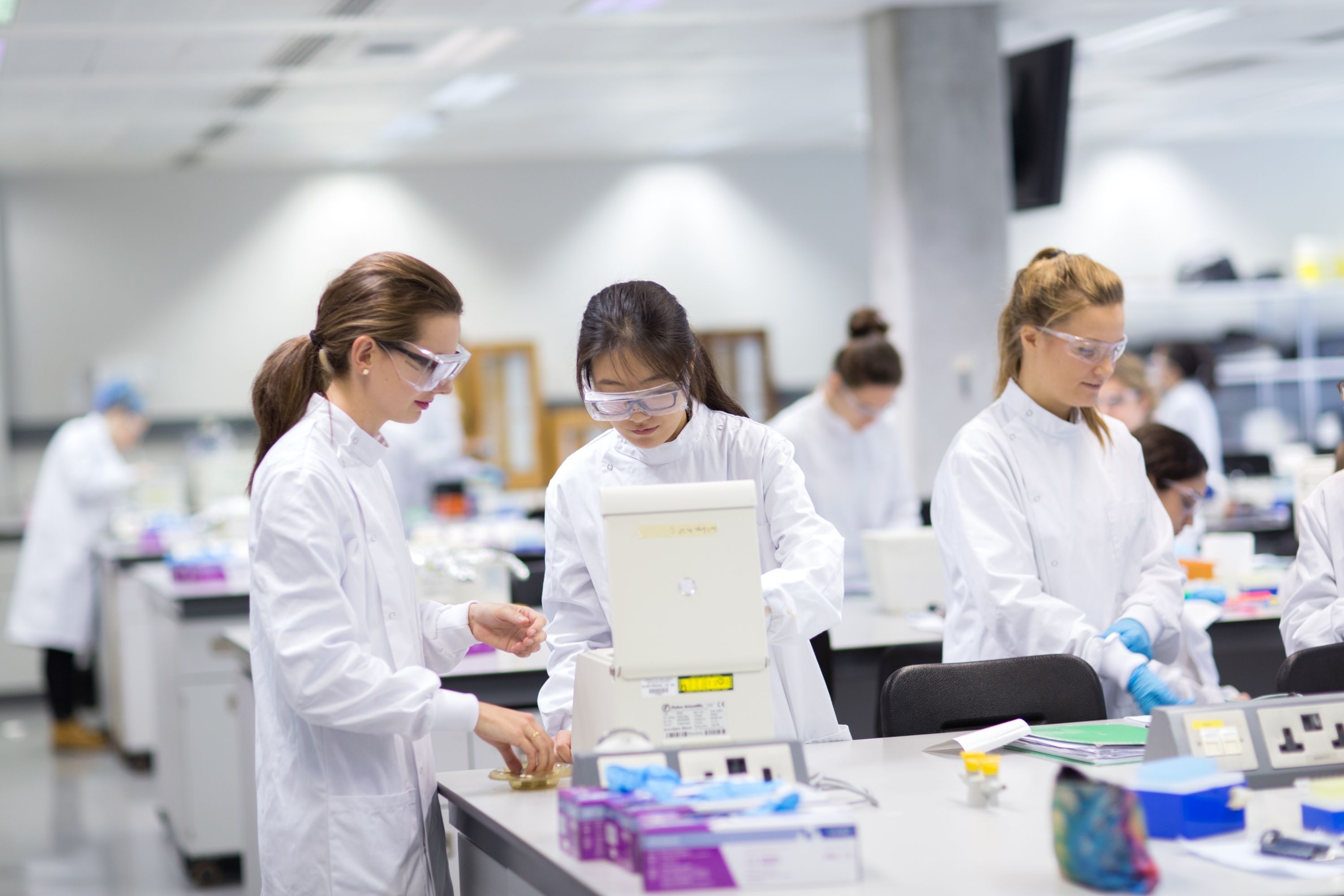 Three students in a lab