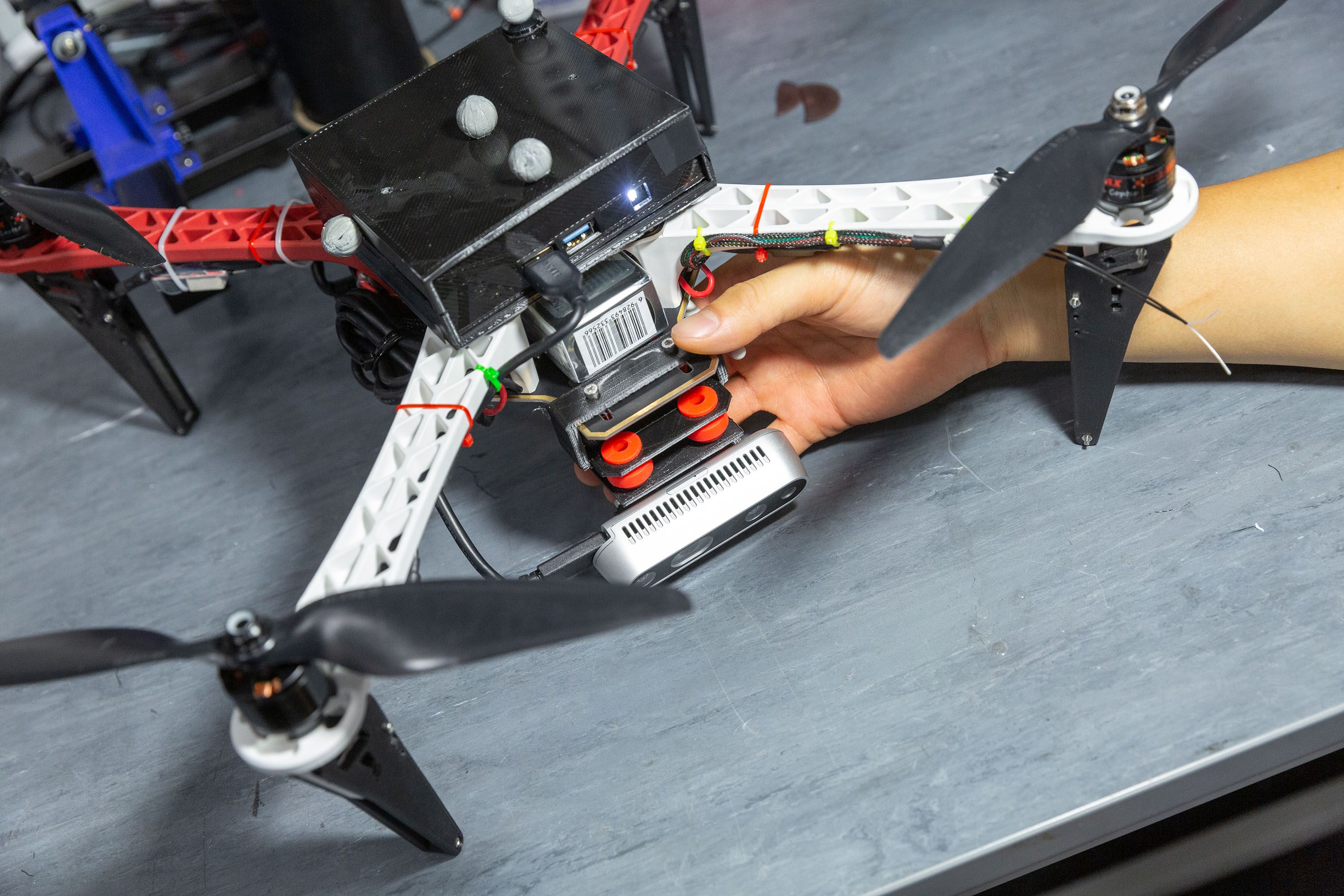 A student working with a drone