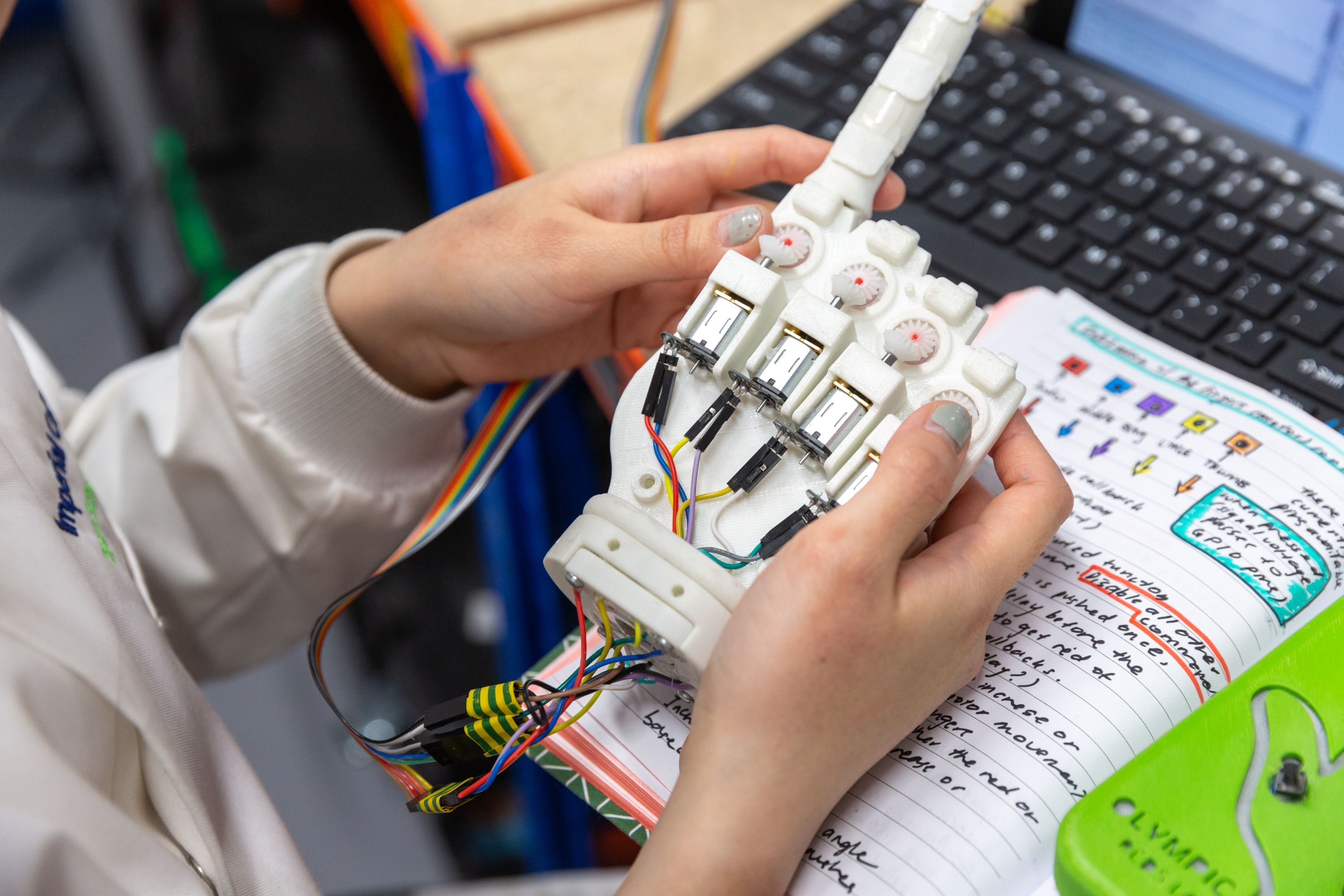 Examining a design engineering project prototype in the lab