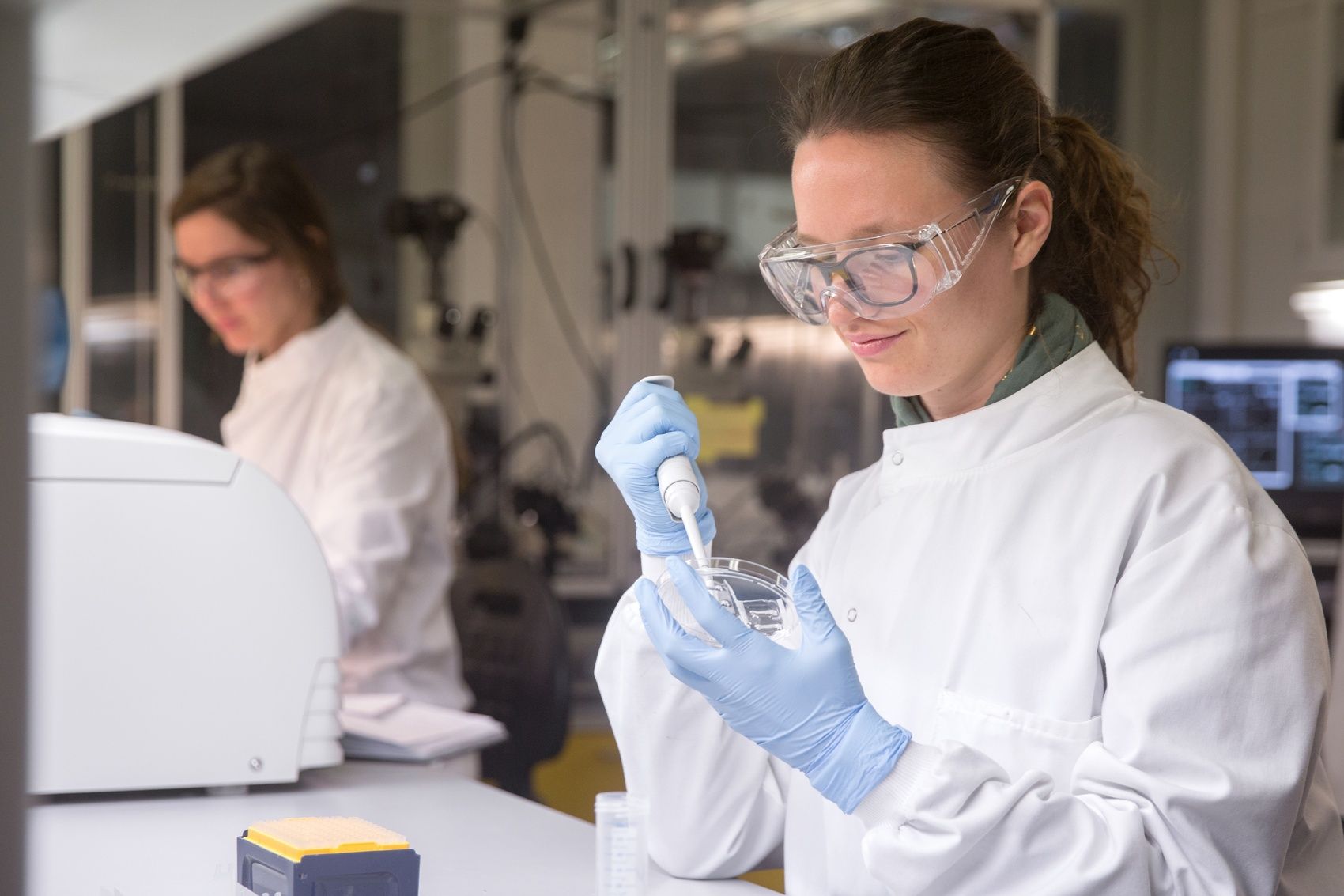 MRes student working on her micro-fluidic device.