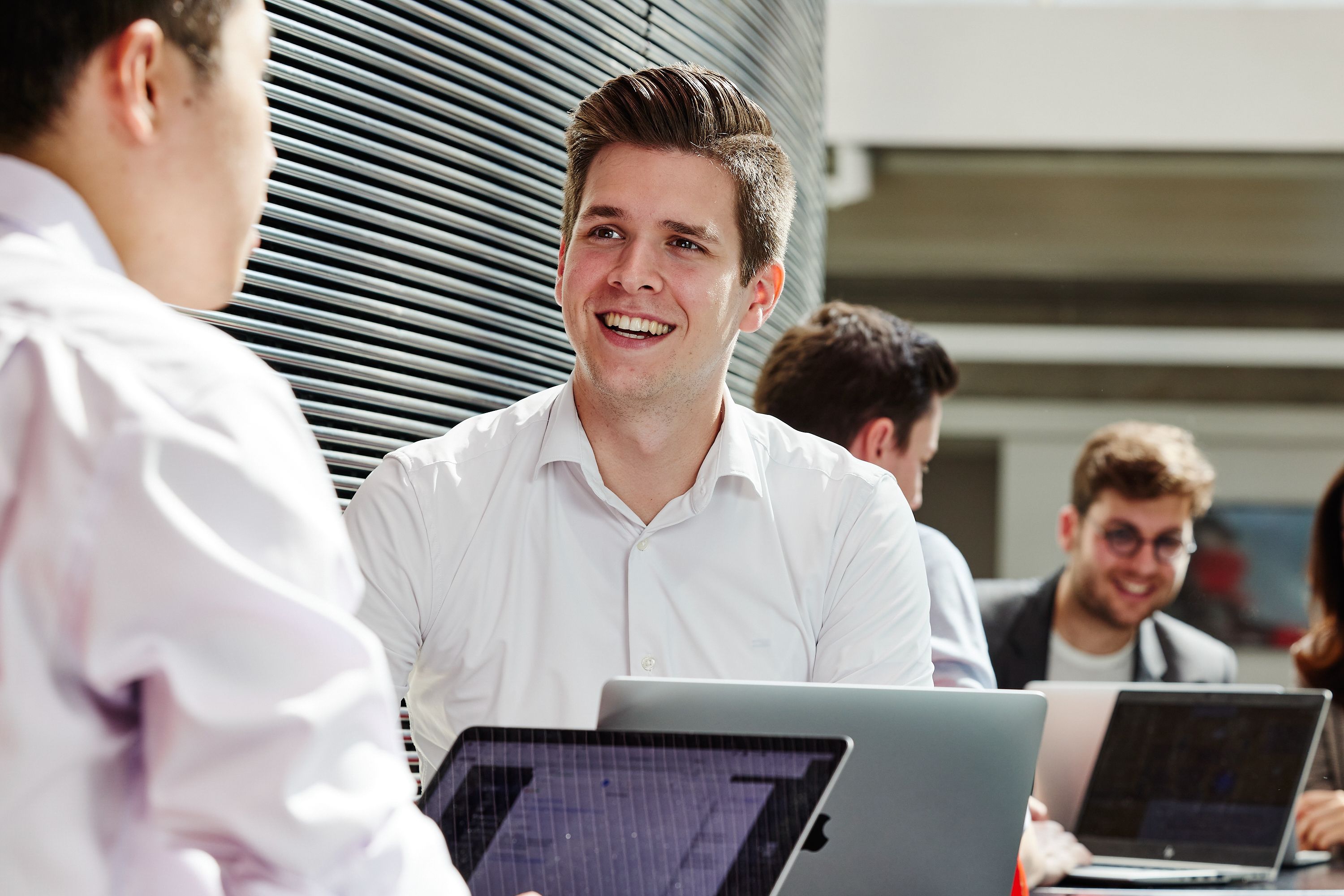 A male student in the Business School Cafe