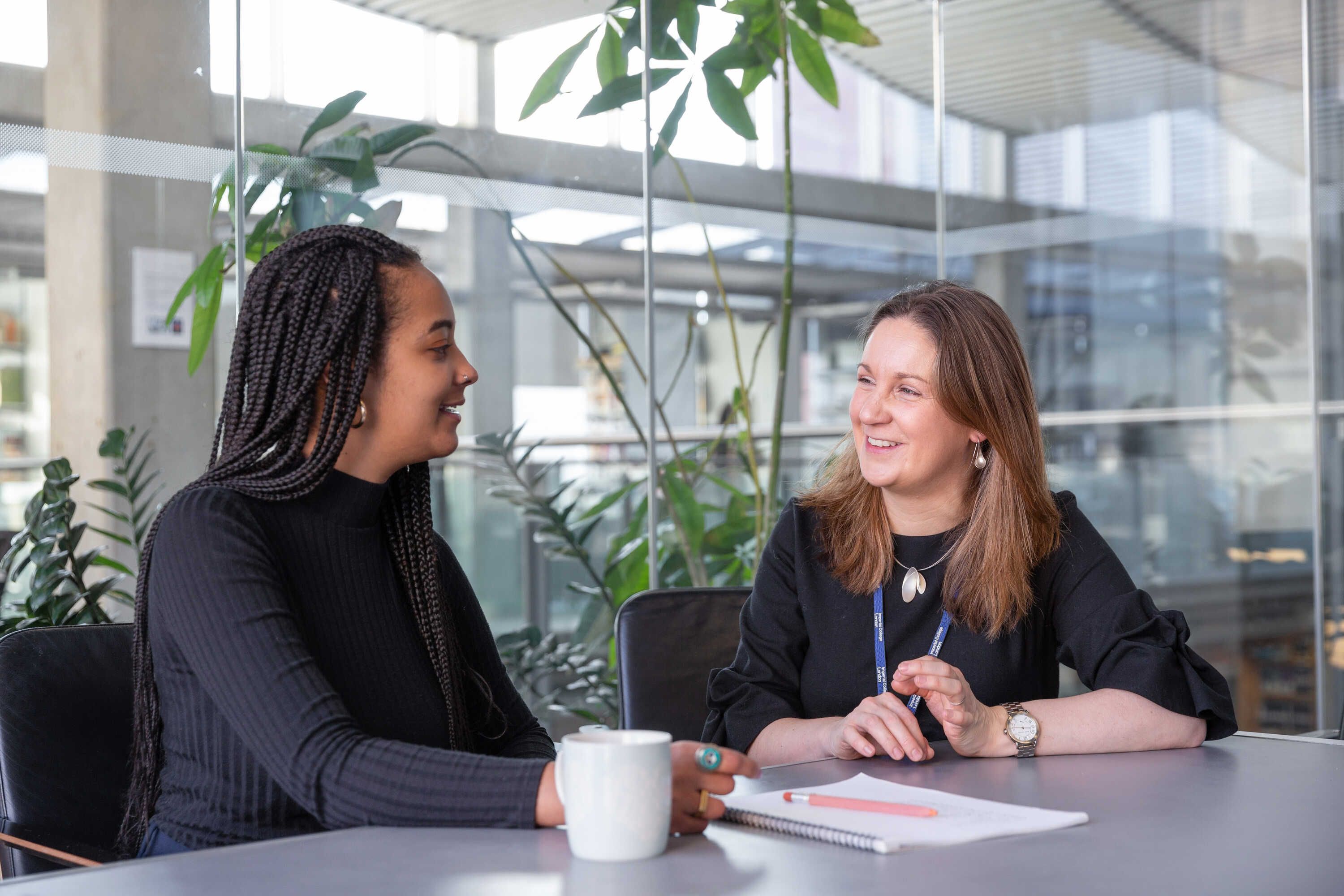 Dr Caroline Howe talking with student Zandile Moyo