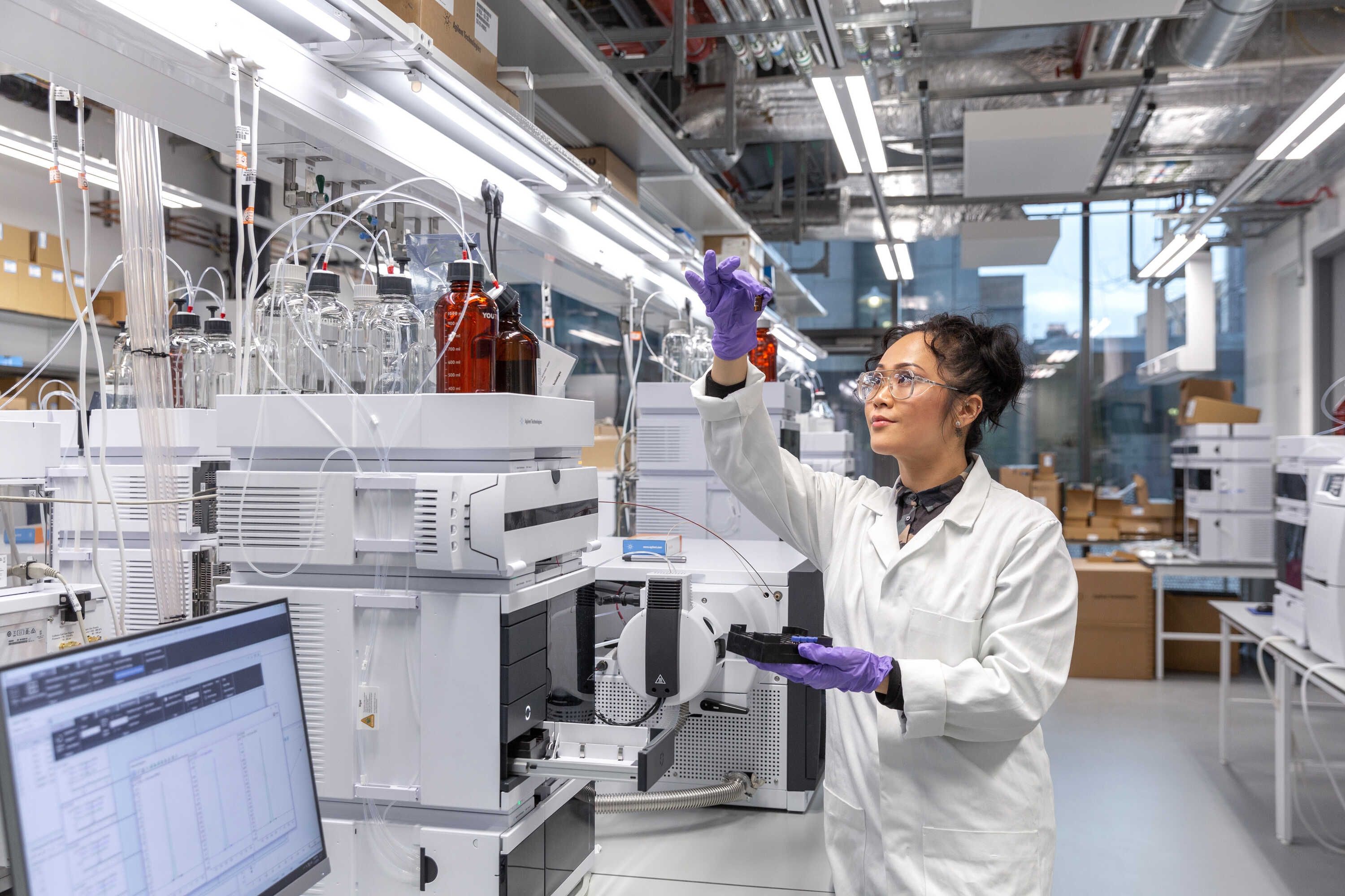 A Chemistry student working in the laboratory.