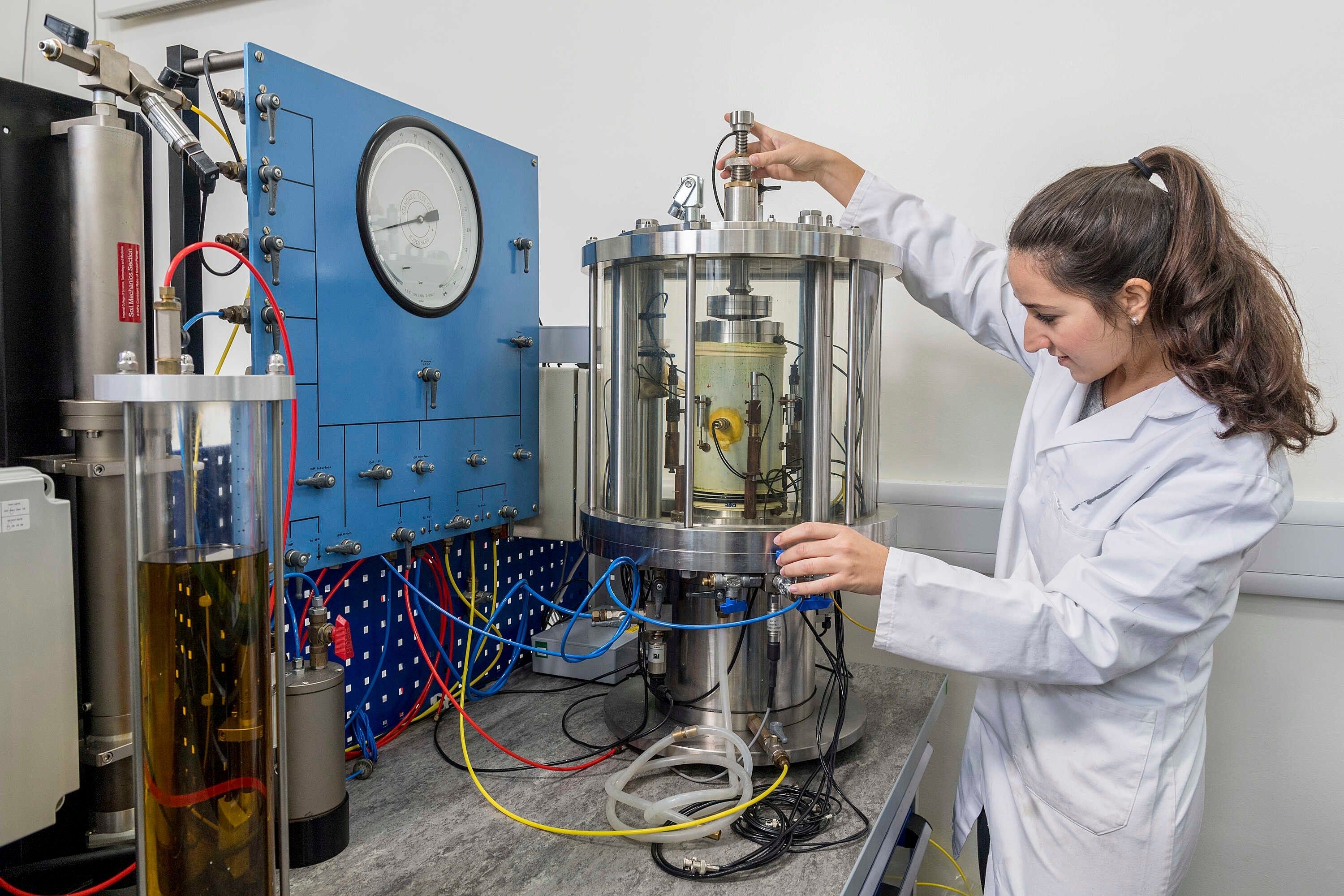 A researcher works in the Geotechnical Engineering lab.