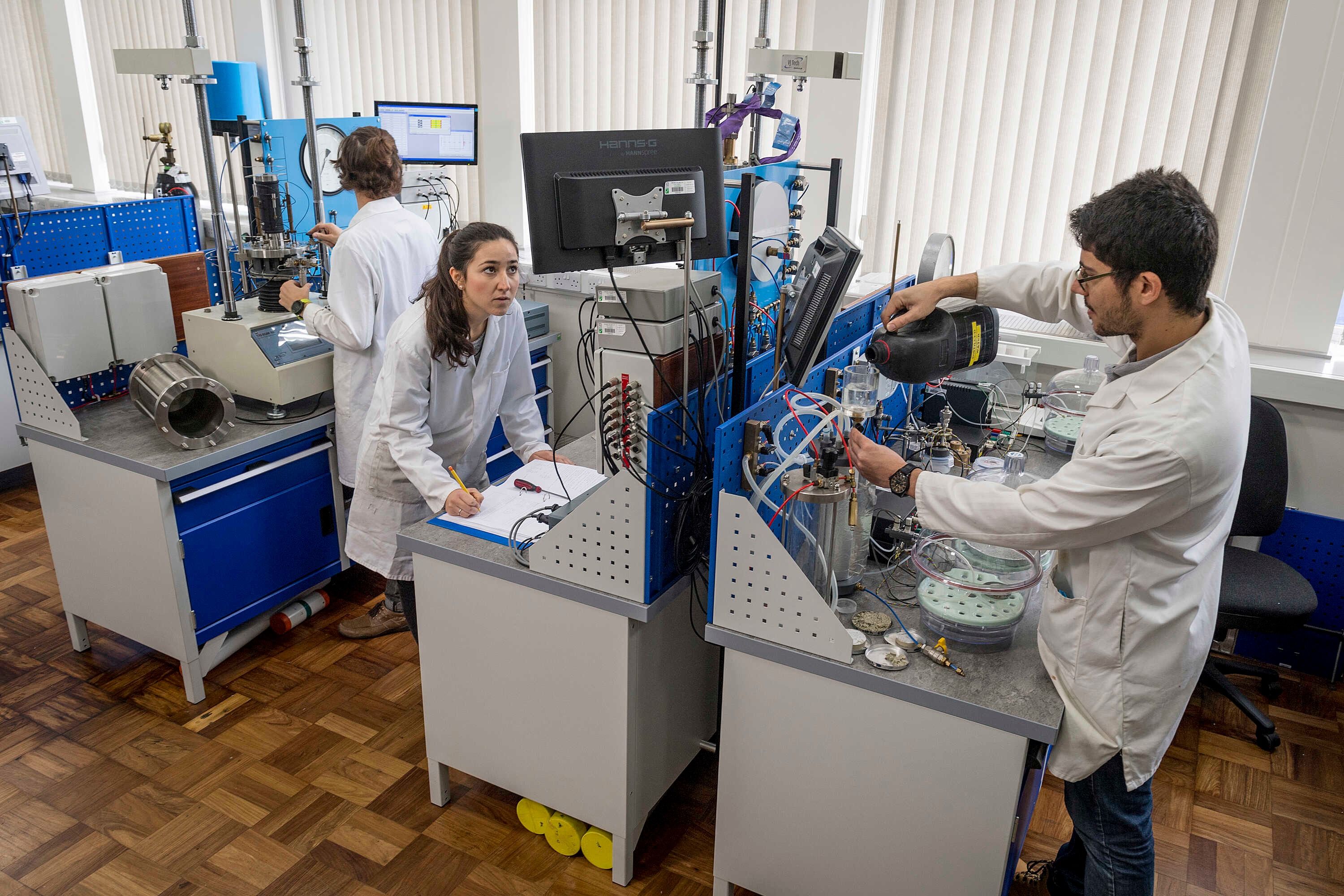 Researchers working in an engineering lab.