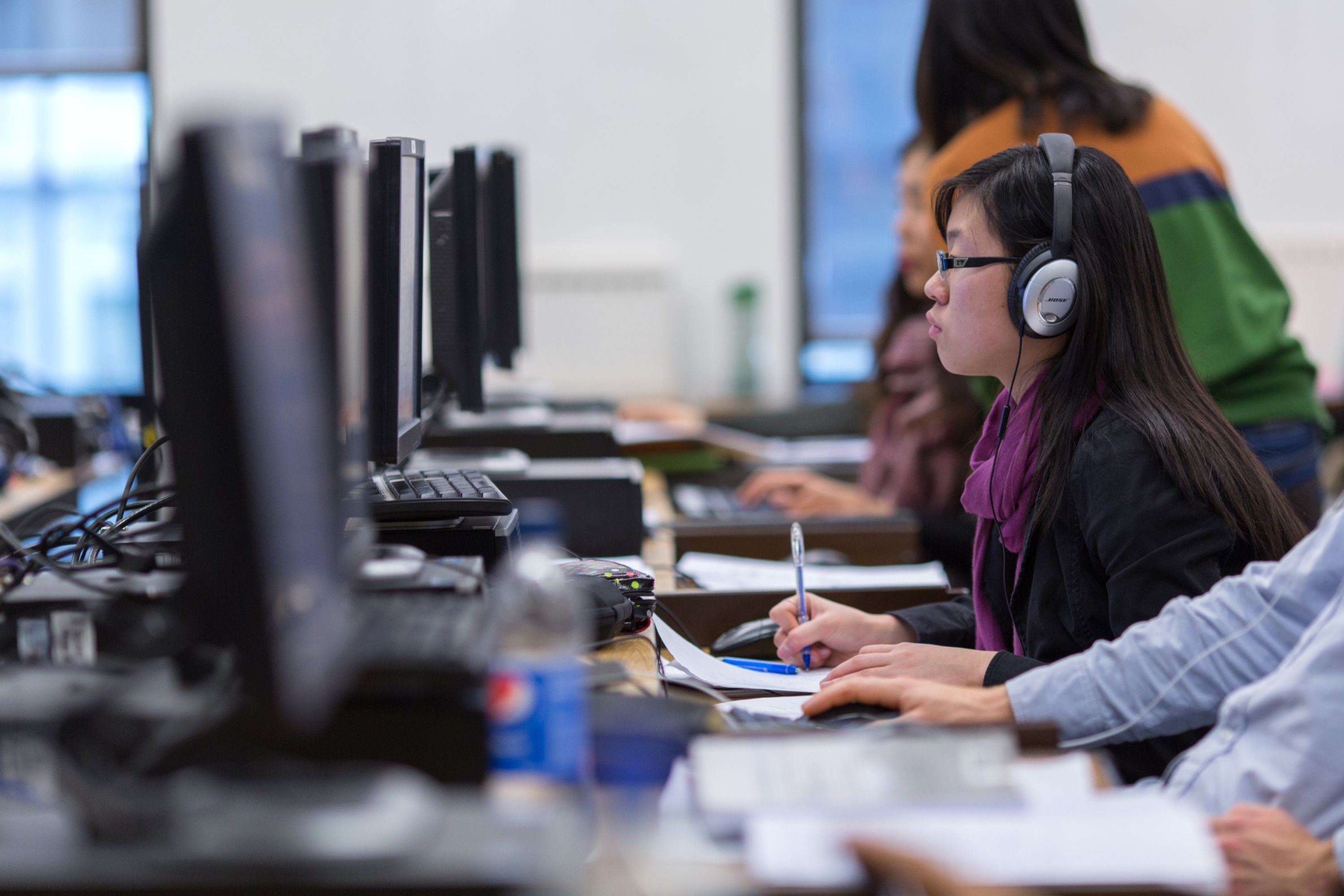 Students in a row on computers