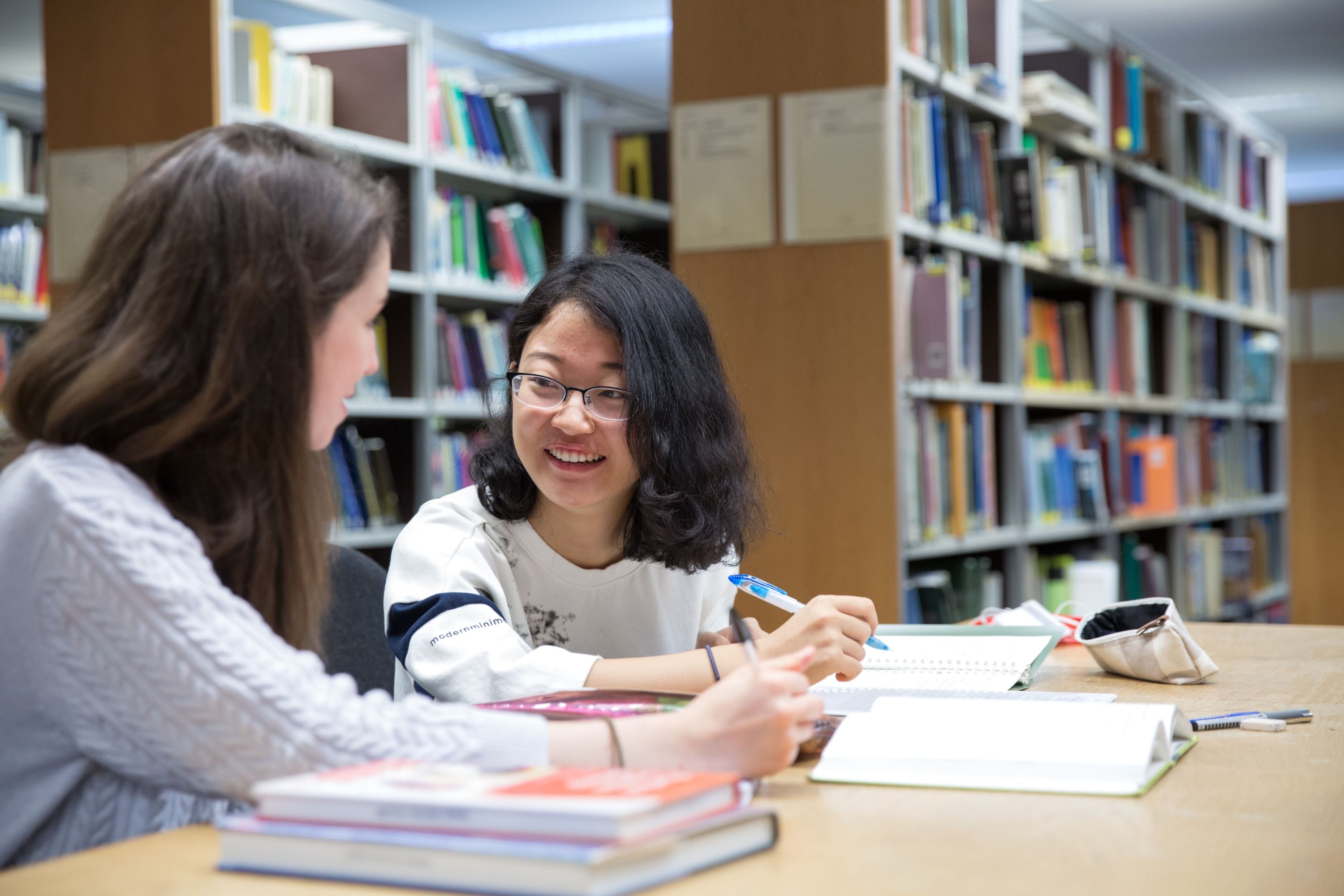 Two students in the library