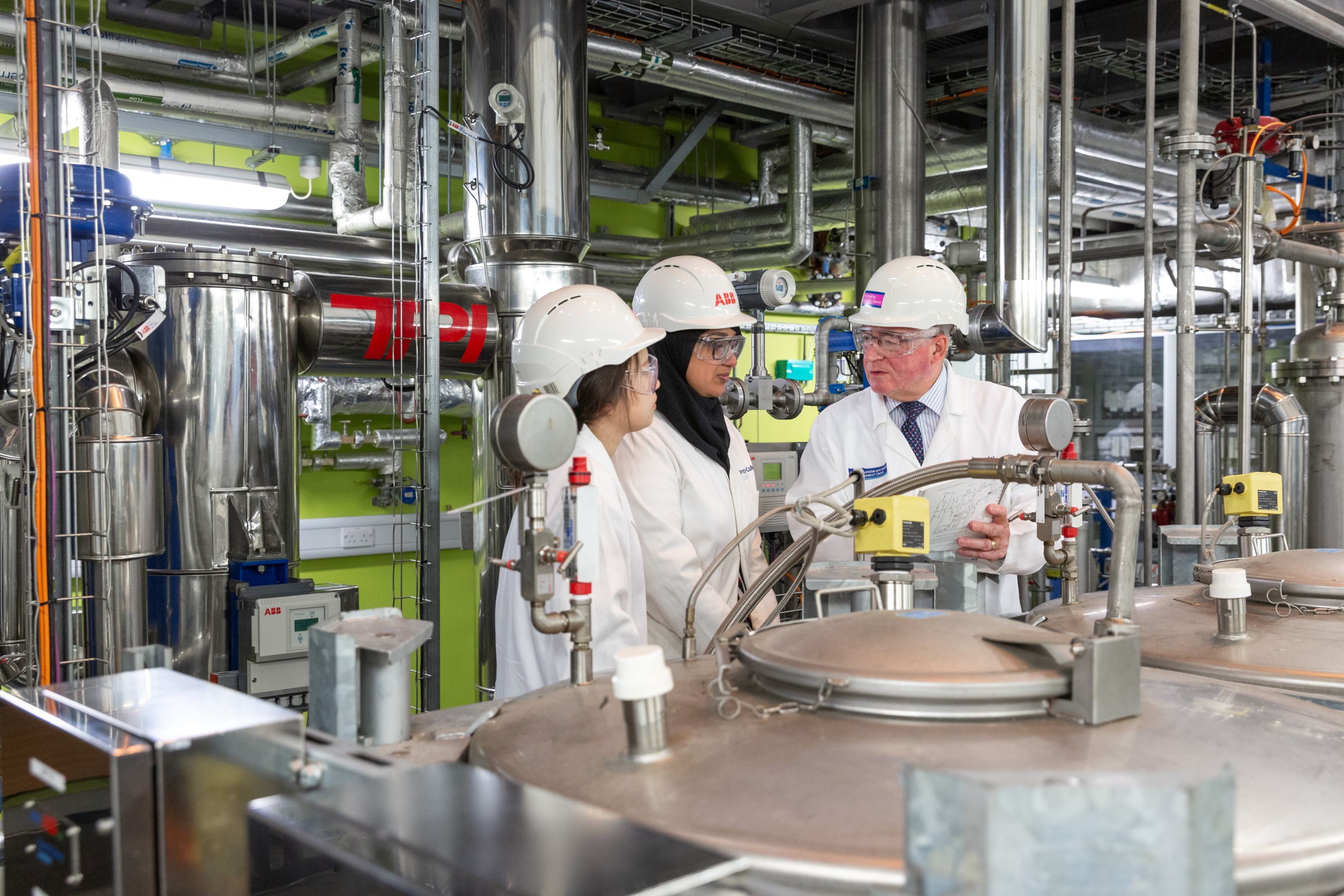 Professor with students in the Energy Futures Lab