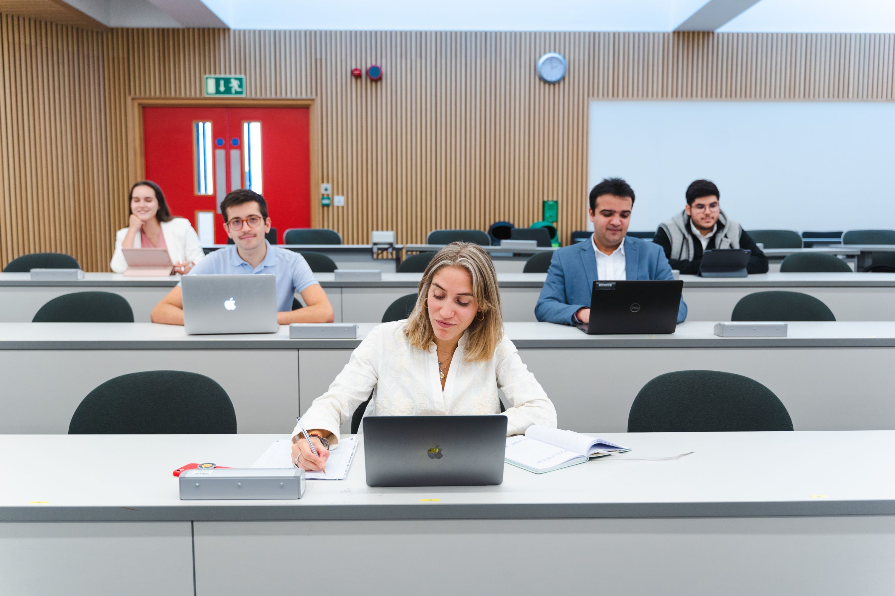 Finance students in a lecture theatre in the Business School