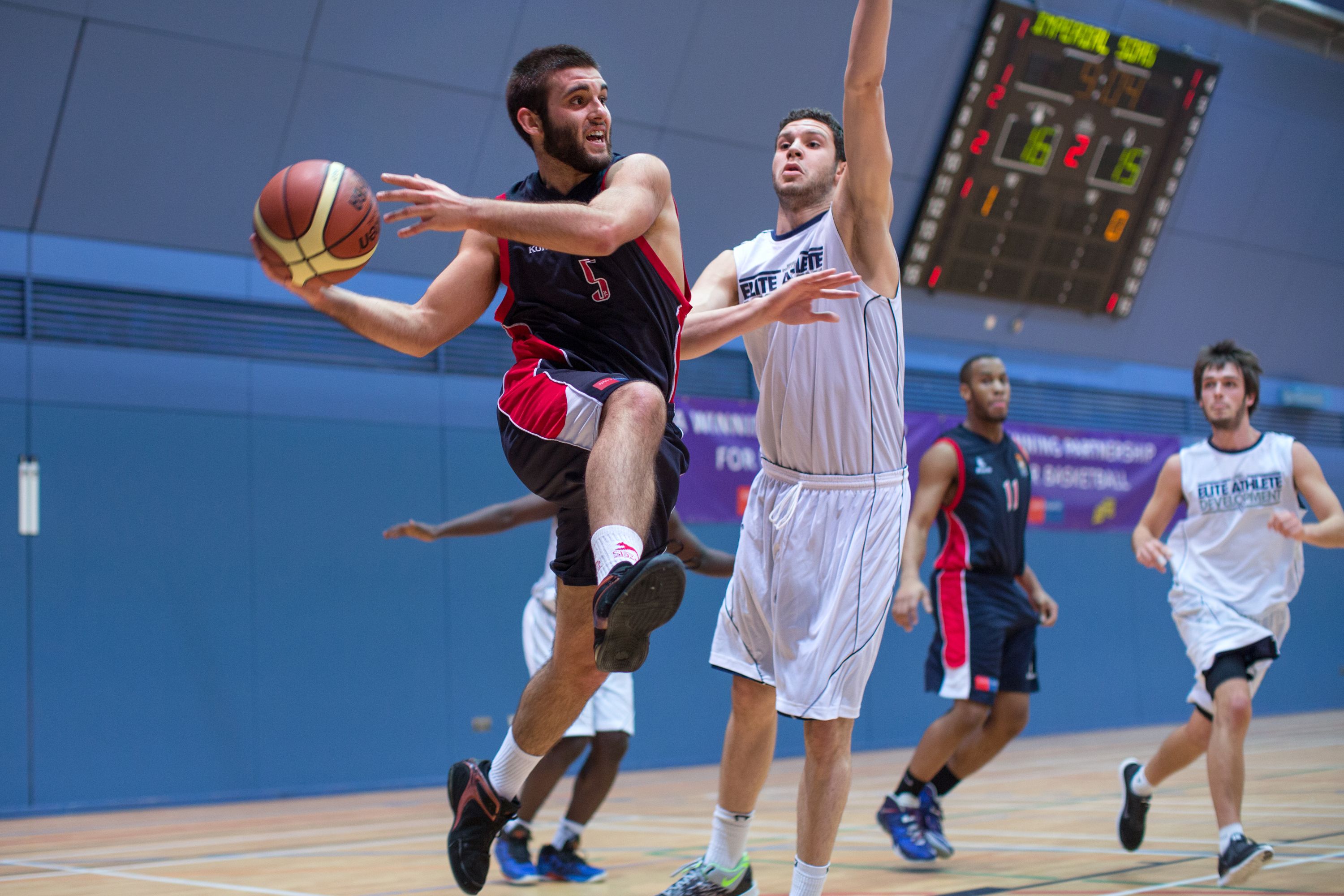 Students playing basketball