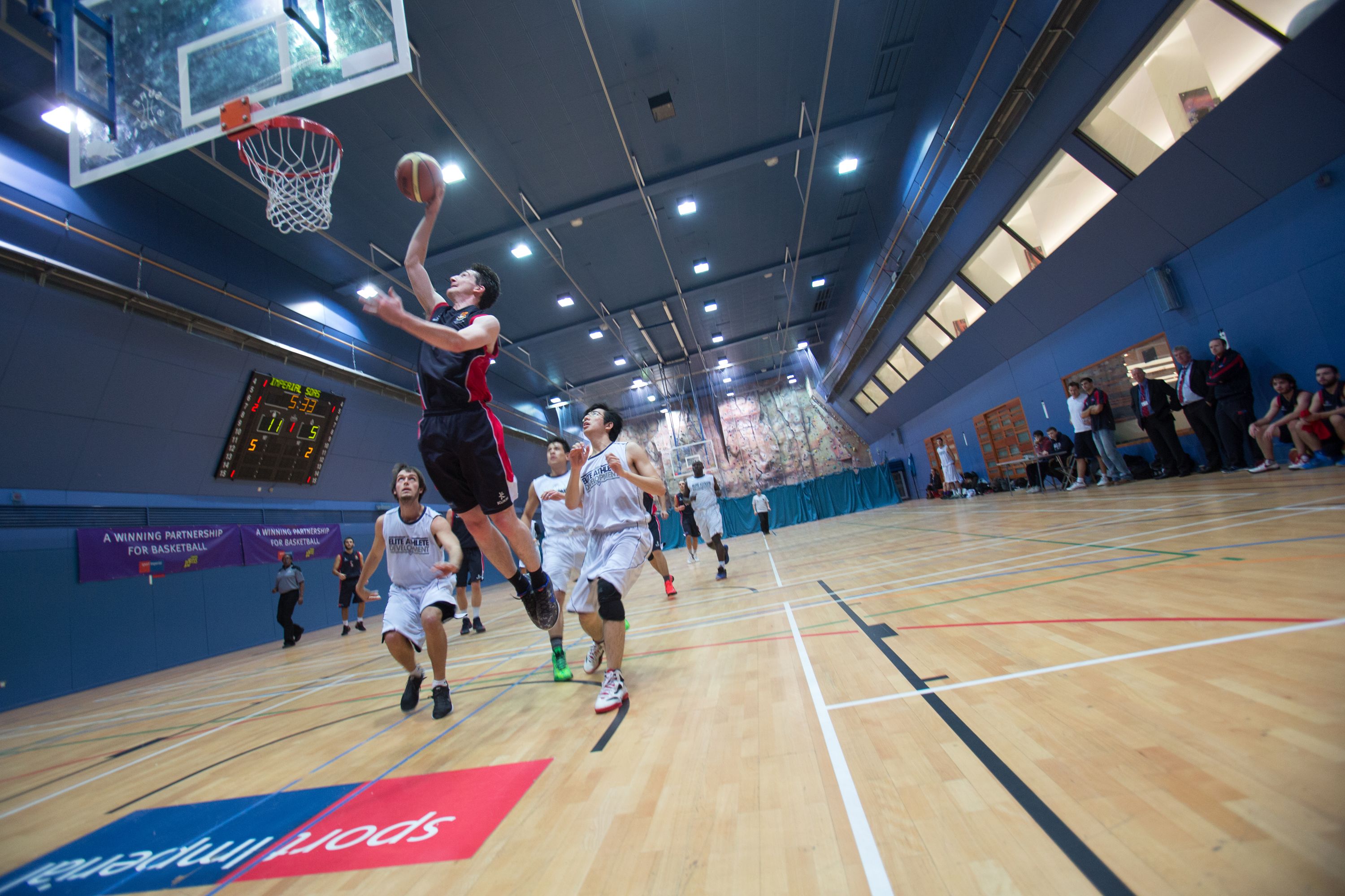 Students playing basketball