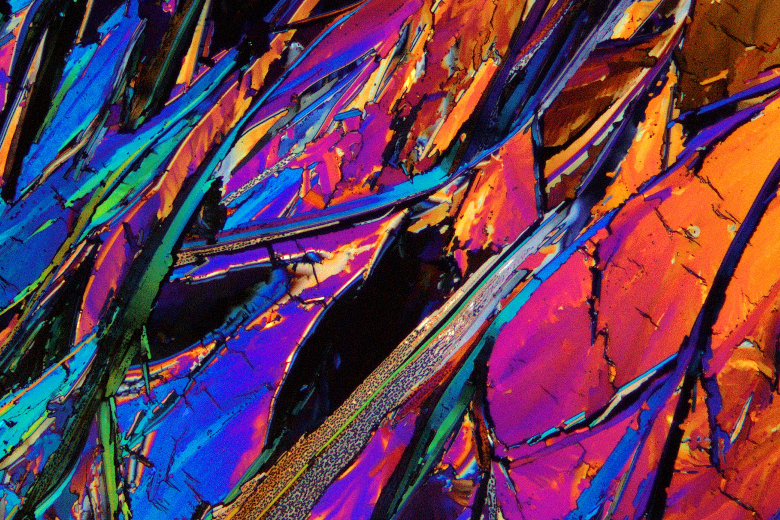 An abstract image of fragmented patches of neon colours